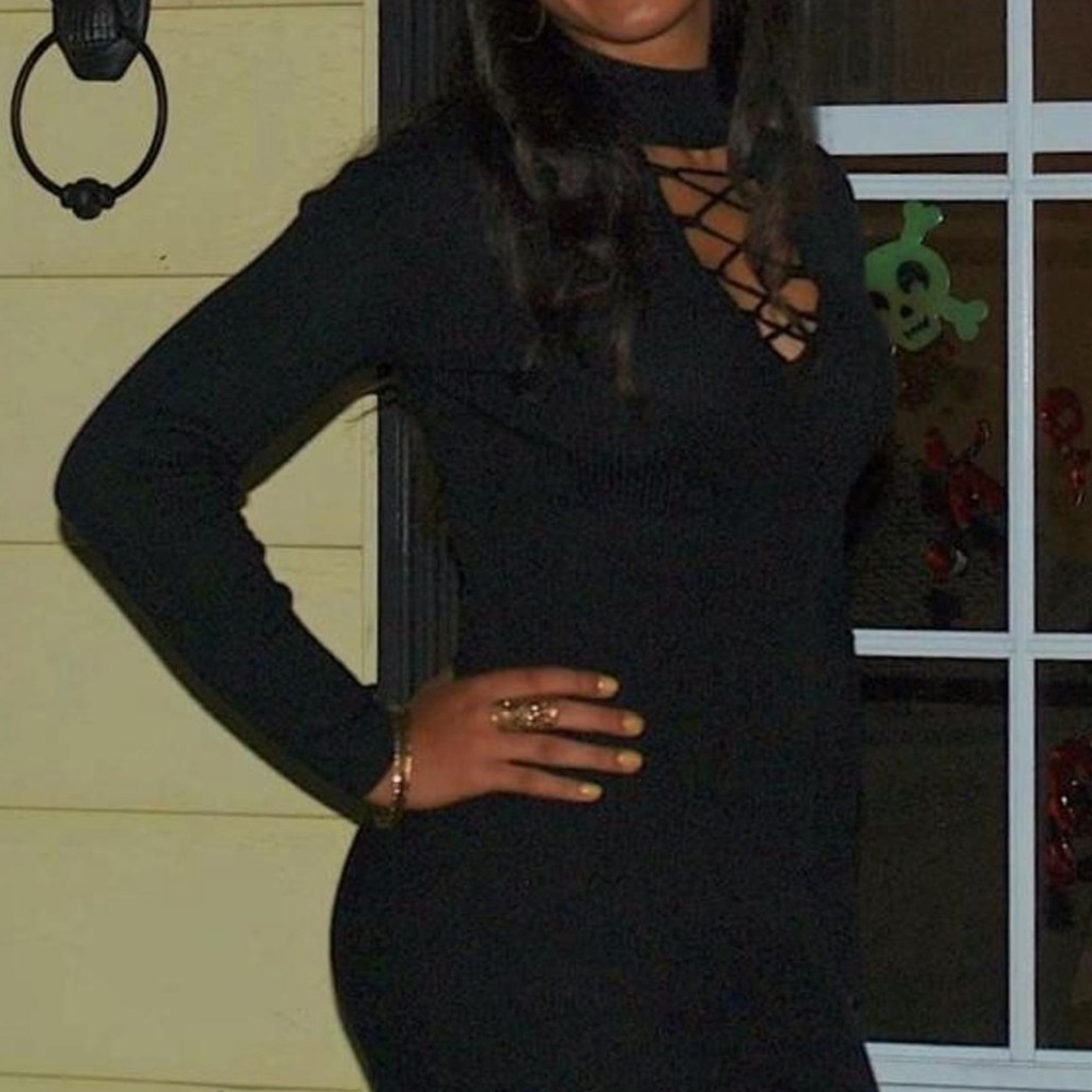 long sleeved black dress w/ lace up chest cut-out from Fashion Nova